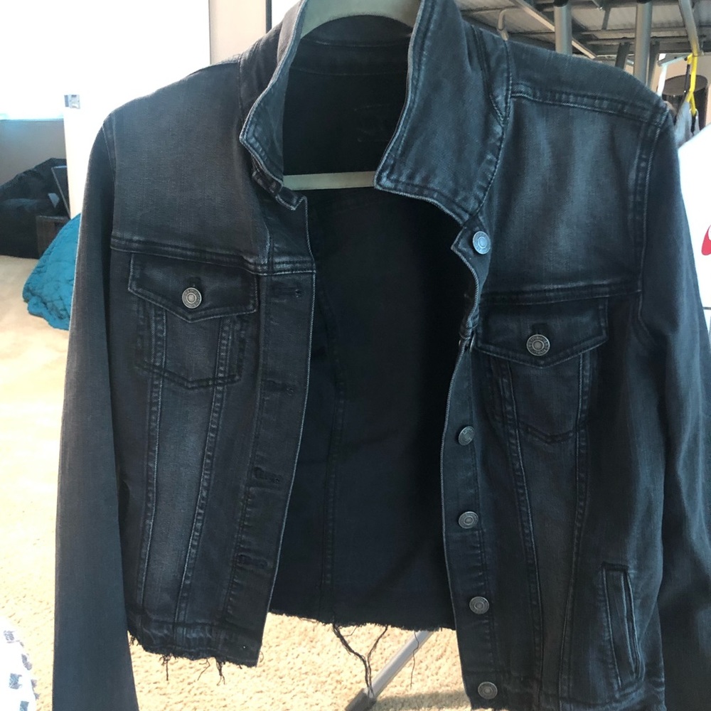 Black jean jacket, stretch material.